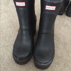 Wedged black hunter boots